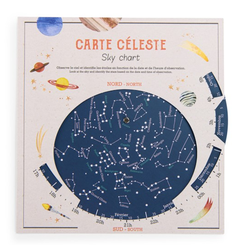 Star chart with constellations on a rotating blue disc labeled 'Carte Céleste' and 'Sky Chart.' Illustrated planets and stars surround the chart.