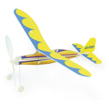 Yellow and blue rubber band powered balsa wood glider airplane toy with propeller and landing gear on white background.