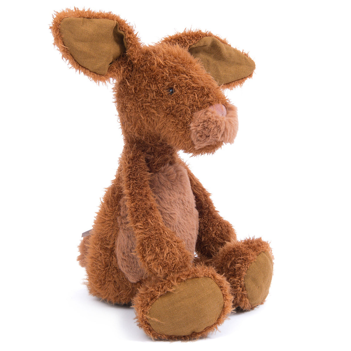 A small, brown plush rabbit with long ears and a fuzzy texture sitting upright against a white background.