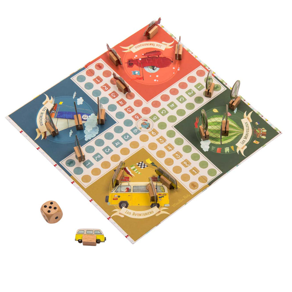 A colorful board game depicting four themed quadrants: red, green, blue, and yellow. Wooden pieces and a dice are placed around the board.