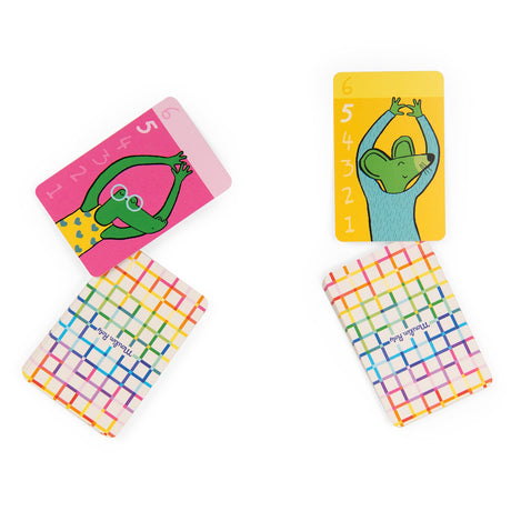 Two decks of colorful "Les Loufoques" cards, showing a green crocodile on pink and a green mouse on yellow.