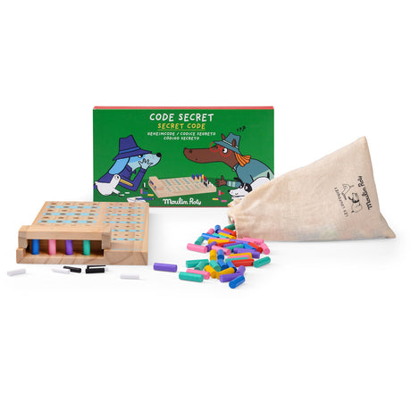 Moulin Roty Secret Code game with wooden board, colorful pegs spilling from a cloth bag, and illustrated box.