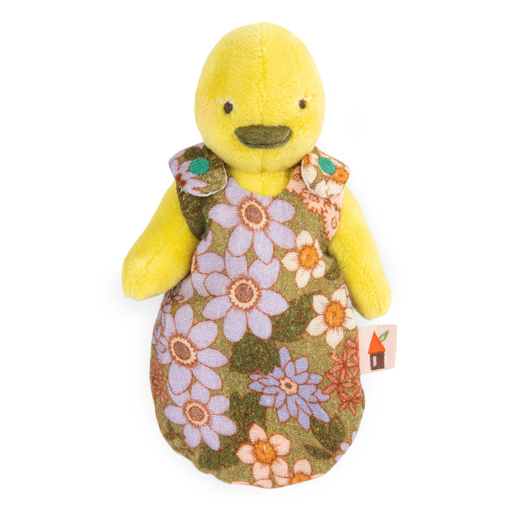 A yellow plush duck toy dressed in a floral-patterned outfit with purple and orange flowers. The toy has a simple, cheerful appearance.