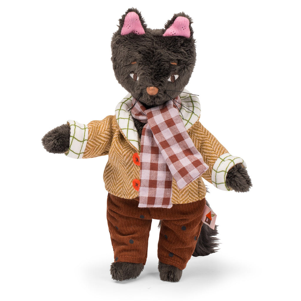 A plush cat toy with gray fur, wearing a tweed jacket, brown pants, and a checkered scarf. The tone is cozy and whimsical.