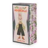 Moulin Roty Les Minouchkas Nine the Rabbit doll toy gift box with floral pattern background.
