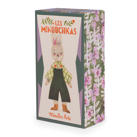 Moulin Roty Les Minouchkas Nine the Rabbit doll toy gift box with floral pattern background.