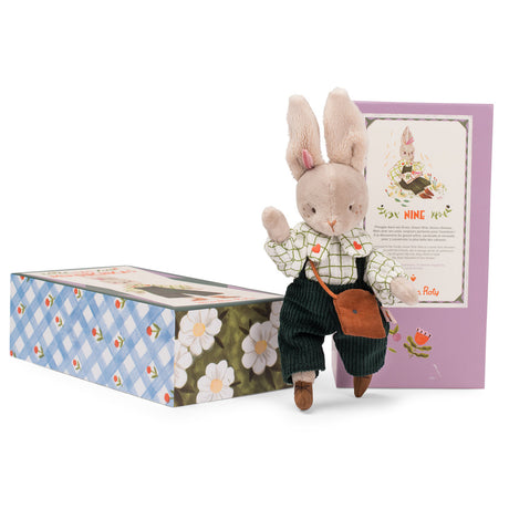 Moulin Roty Nine the rabbit plush doll in green overalls with illustrated gift boxes.