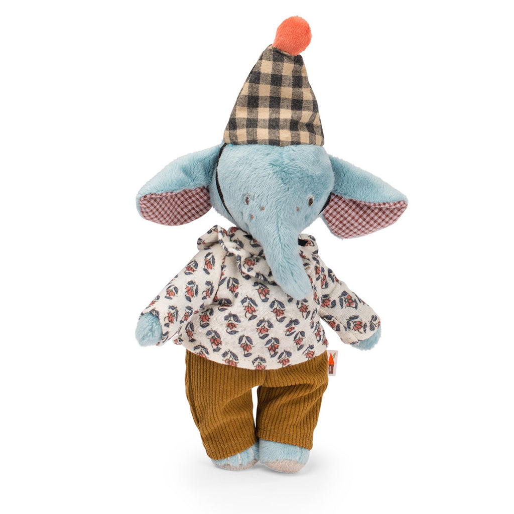 A soft toy elephant dressed in a patterned shirt and brown pants. It wears a checkered hat with an orange pompom, conveying a playful and whimsical vibe.