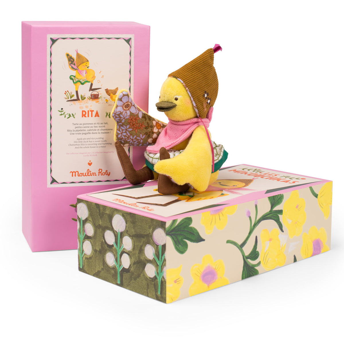 Moulin Roty Les Minouchkas Rita the Duck plush toy with illustrated gift boxes.