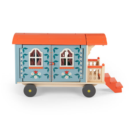 Les Minouchkas wooden toy caravan with blue floral details and orange roof.