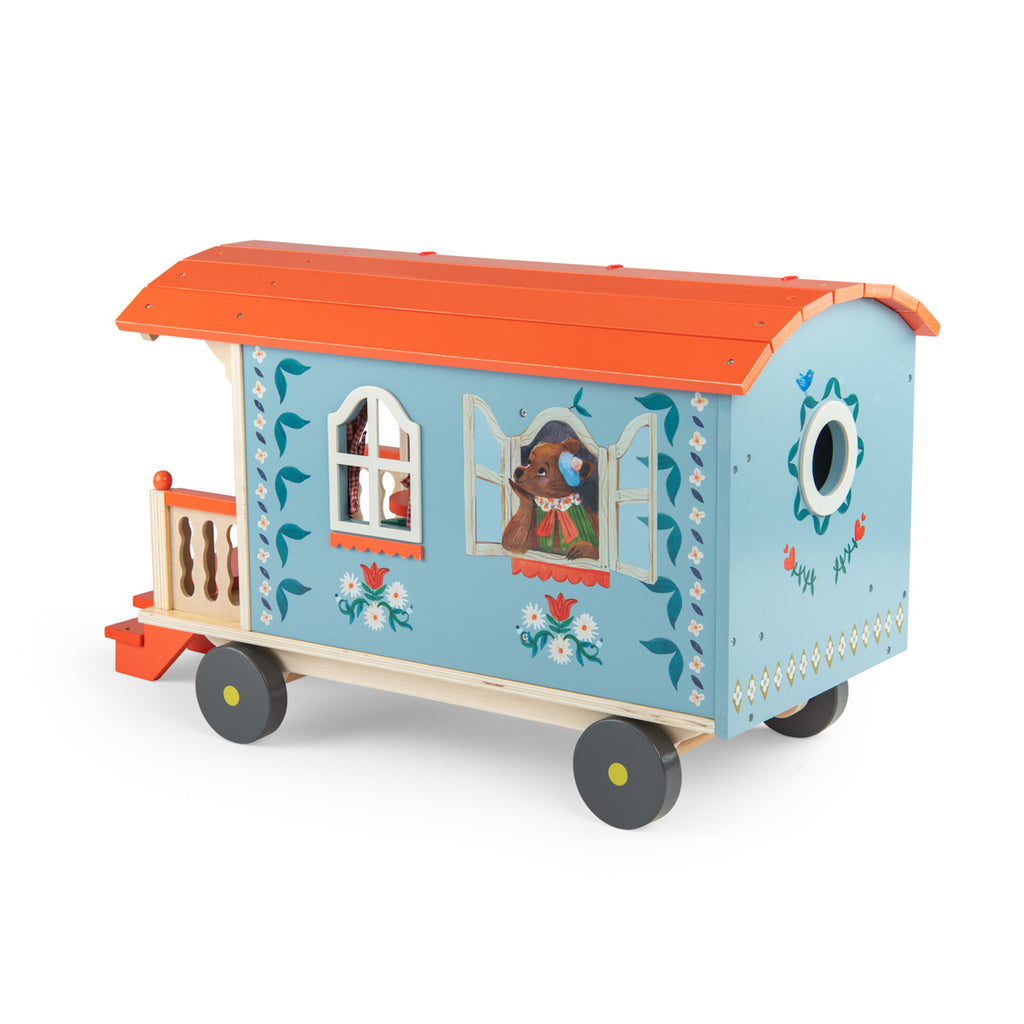 Toy wagon with a colorful design, featuring a blue body with floral patterns, an orange roof, and tiny stairs leading to a small porch on wheels.