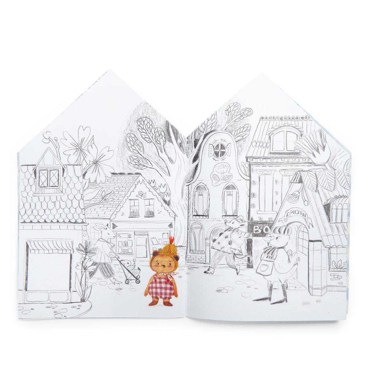 Les Minouchkas coloring book open page showing a cute illustrated village street with animal characters.