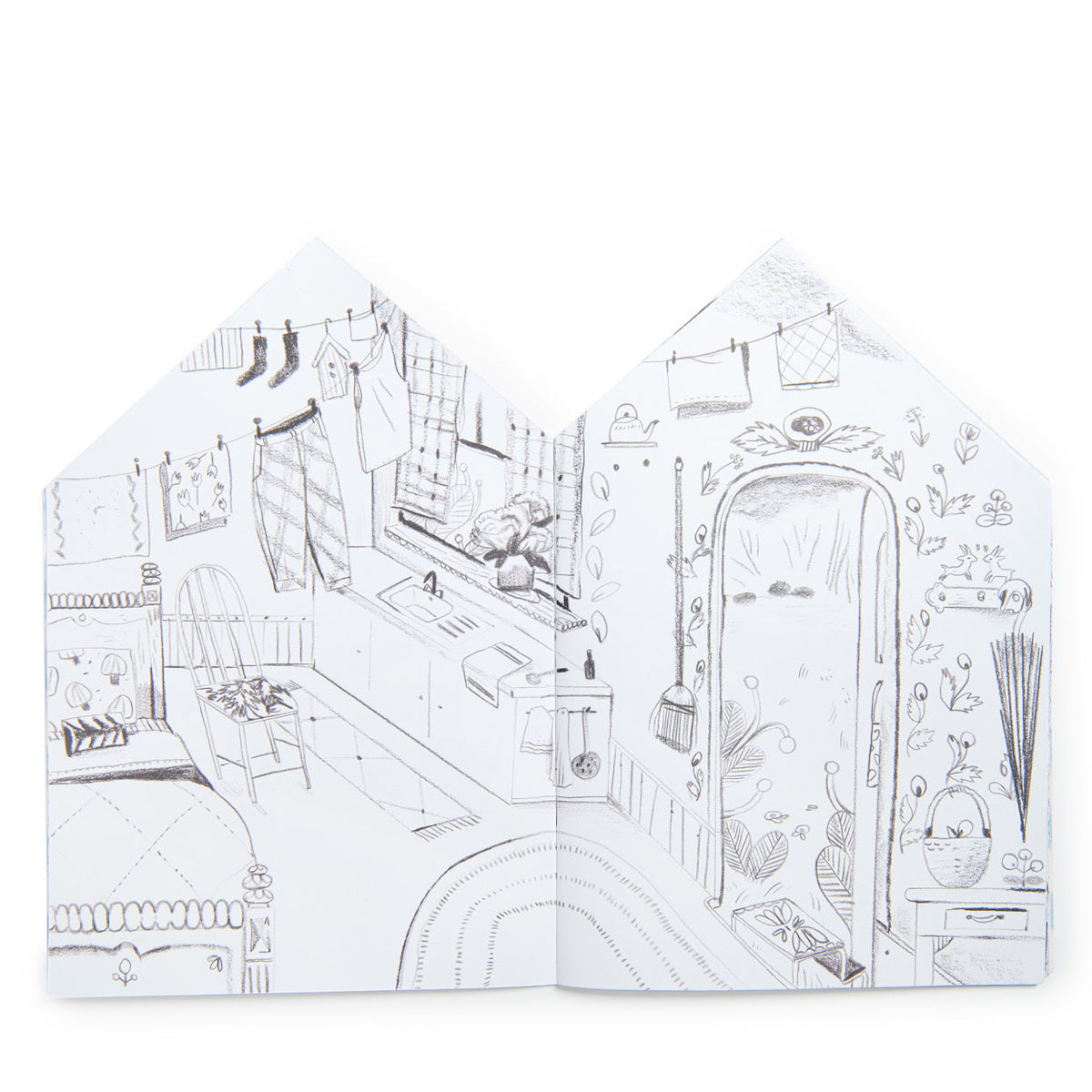 Les Minouchkas house-shaped coloring book showing a detailed, hand-drawn cozy kitchen and bedroom interior.
