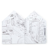 Les Minouchkas house-shaped coloring book showing a detailed, hand-drawn cozy kitchen and bedroom interior.