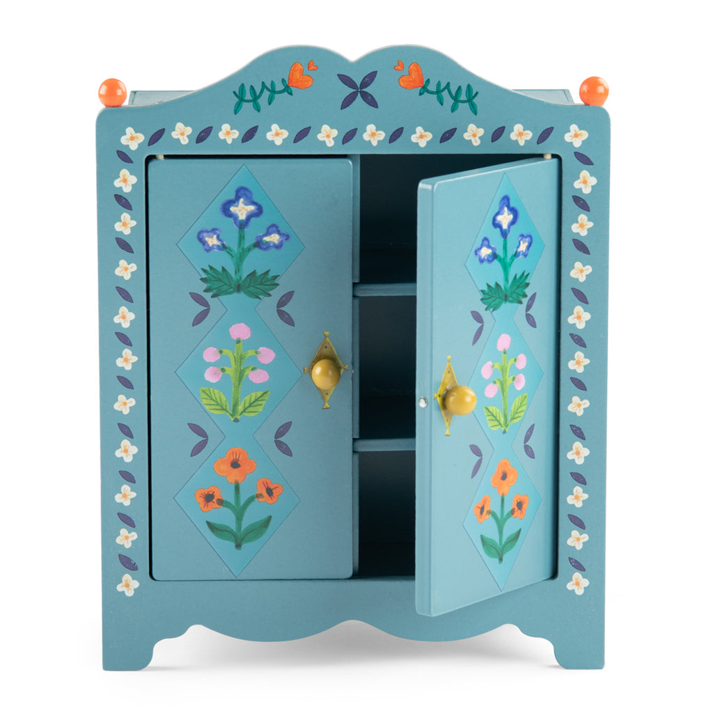 Blue wooden toy wardrobe with floral patterns and orange knobs.