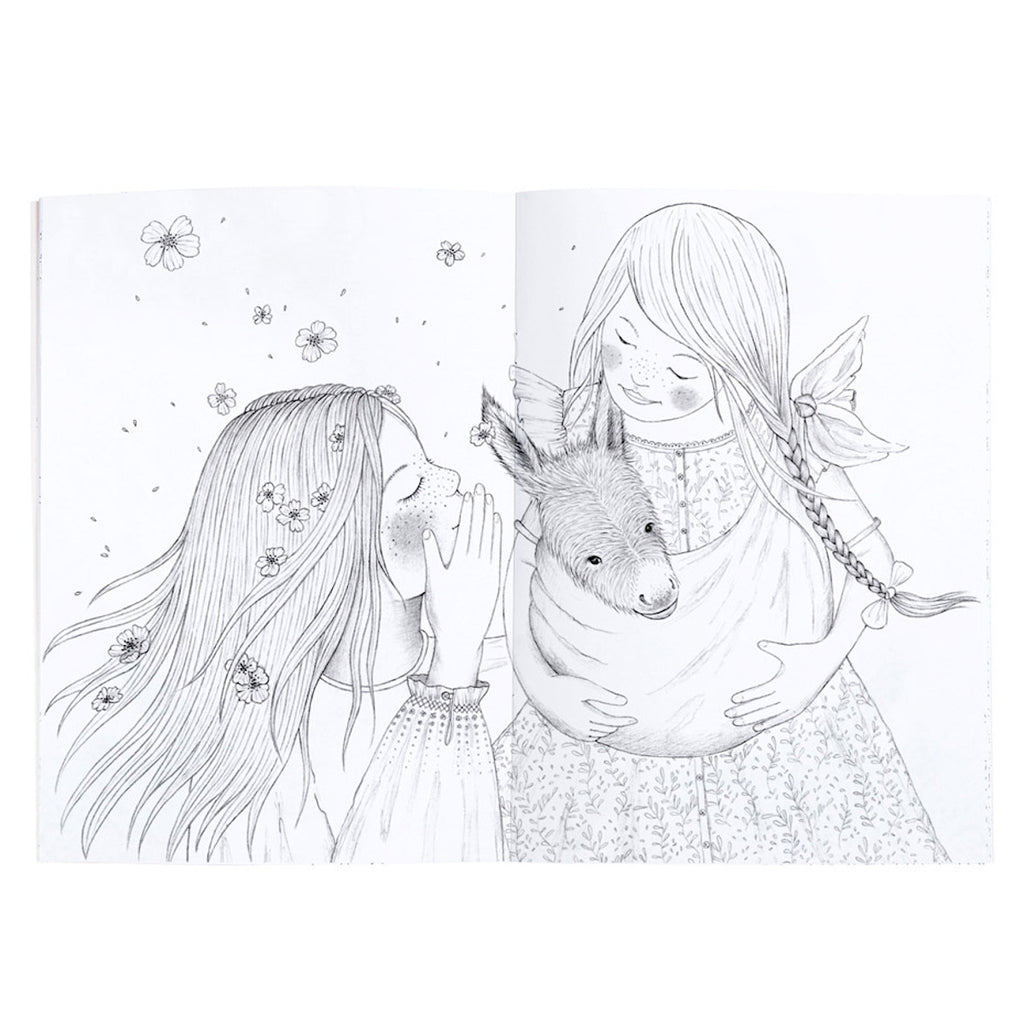 Two girls with long hair and flower accents interact in a black-and-white drawing. One holds a small donkey tenderly, while flowers float around. The scene feels whimsical and serene.