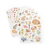 Watercolor woodland animal sticker sheets featuring bears, cats, mushrooms, and autumn leaves on white background.