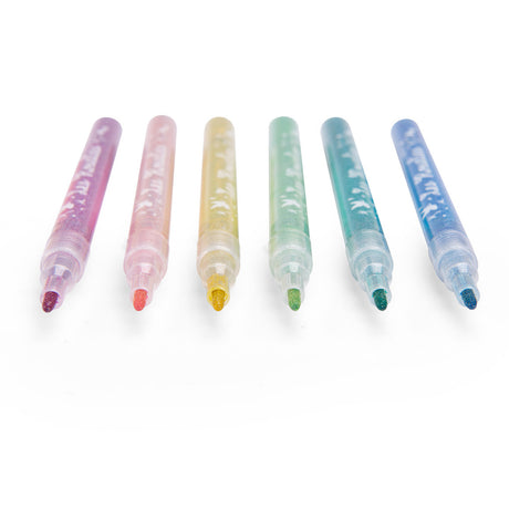 Set of six Les Rosalies colorful glitter felt pens lined up on a white background.