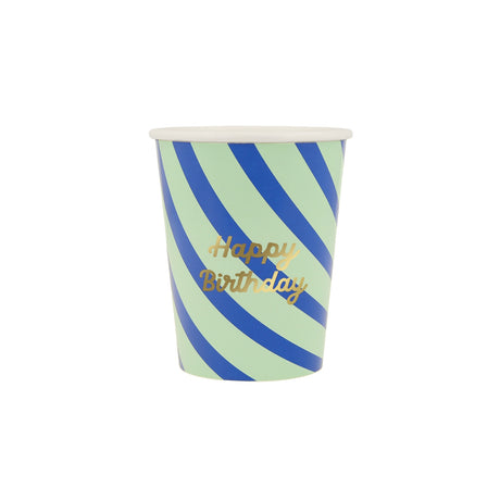 Green and blue striped paper cup with gold script reading Happy Birthday.