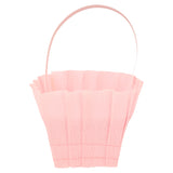 Light pink crepe paper Easter basket with a thin handle, designed for spring party treats and egg hunts.
