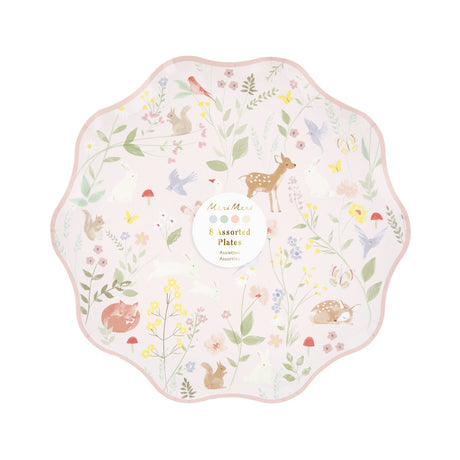 Scalloped paper plate with a pastel woodland animal and floral pattern.
