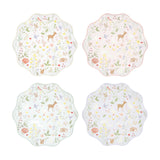 Four wavy-edged paper plates in pastel colors featuring a woodland animal and wildflower pattern.