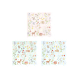 Three paper napkins in pink, mint, and blue with a matching pastel woodland animal and floral pattern.