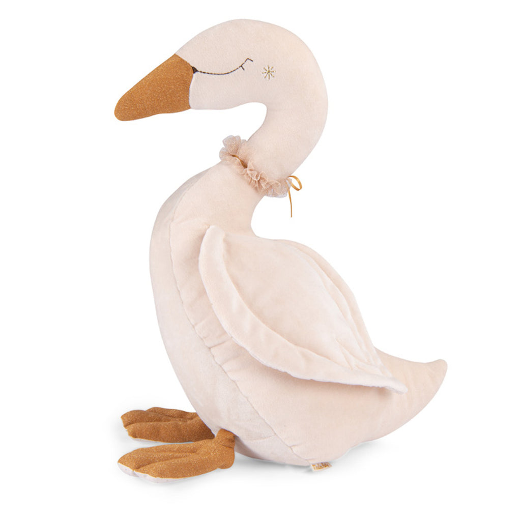 Plush swan toy with a cream body and golden beak, featuring soft textured wings and feet. The toy has a peaceful expression and a decorative neck bow.