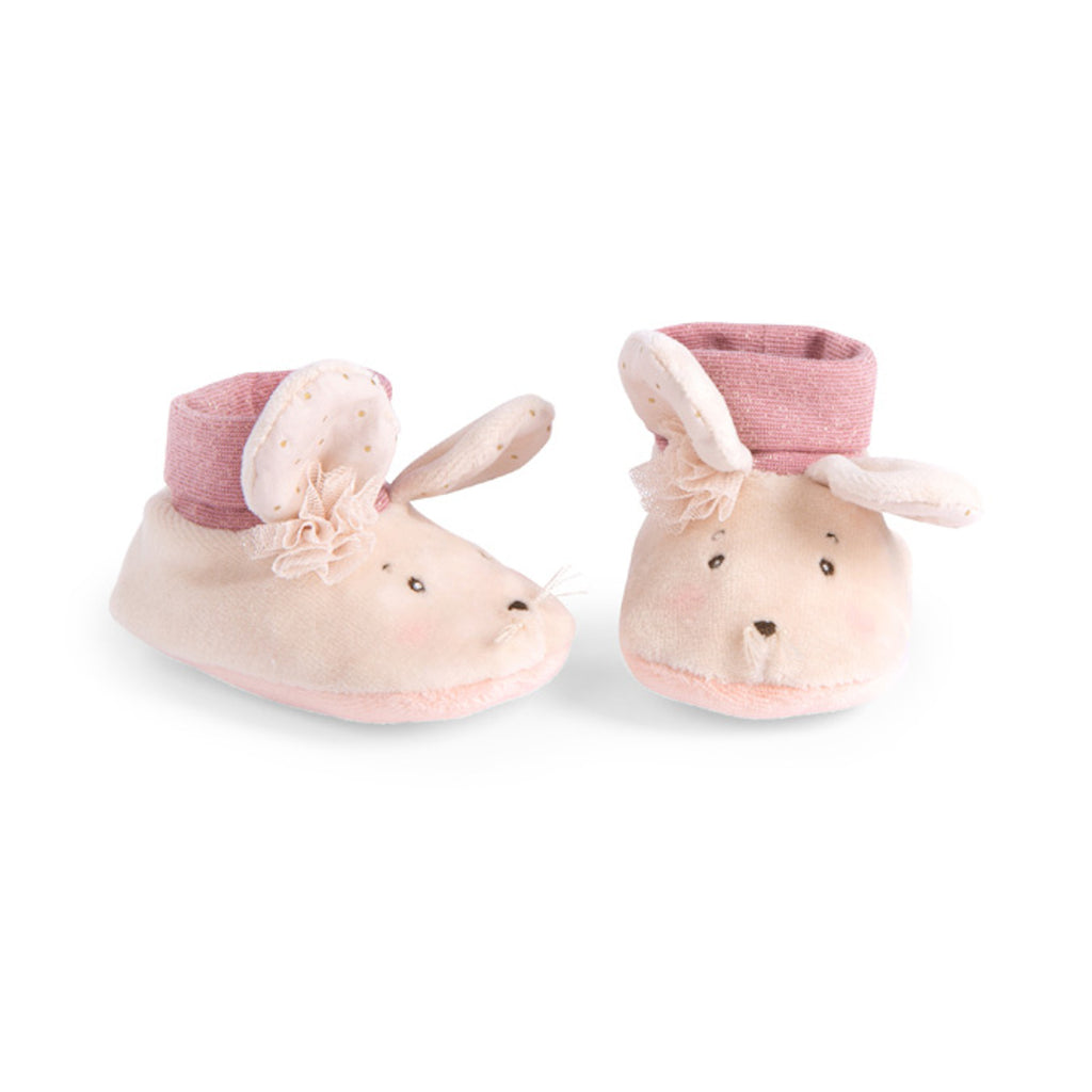 Soft baby booties shaped like mouse, featuring floppy ears and pink cuffs, arranged playfully against a white background, conveying warmth and cuteness.