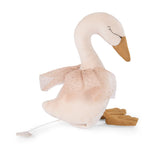 A plush swan toy with a long neck and a gentle expression, wearing a delicate, gold-dotted pink tutu. It exudes a soft and elegant charm.