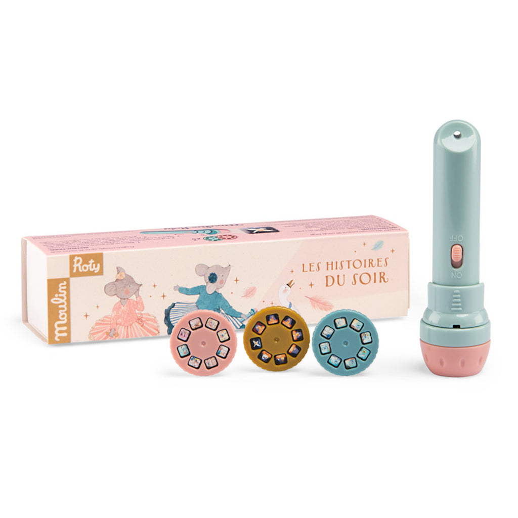 A pastel-colored story projector set, featuring a pink box with whimsical animal illustrations. Includes a pale blue projector and three colorful story discs.