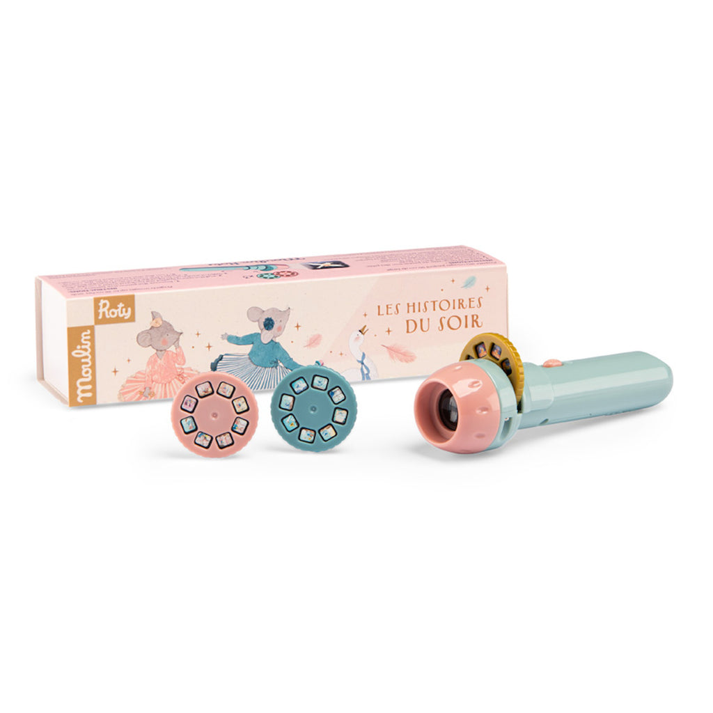 A pastel-colored story projector set, featuring a pink box with whimsical animal illustrations. Includes a pale blue projector and three colorful story discs.