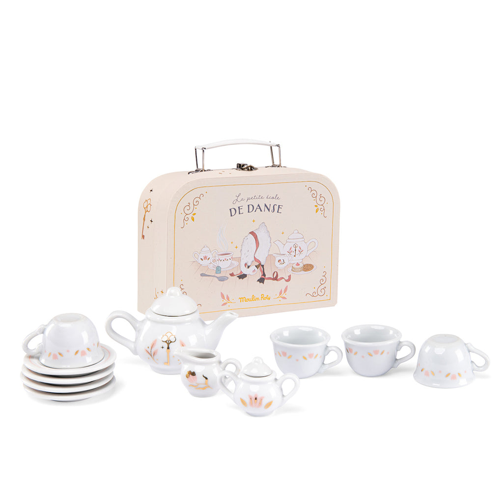 Toy tea set with a beige carrying case featuring ballet-themed graphics. Includes a teapot, cups, saucers, and a sugar pot, all decorated with whimsical designs.