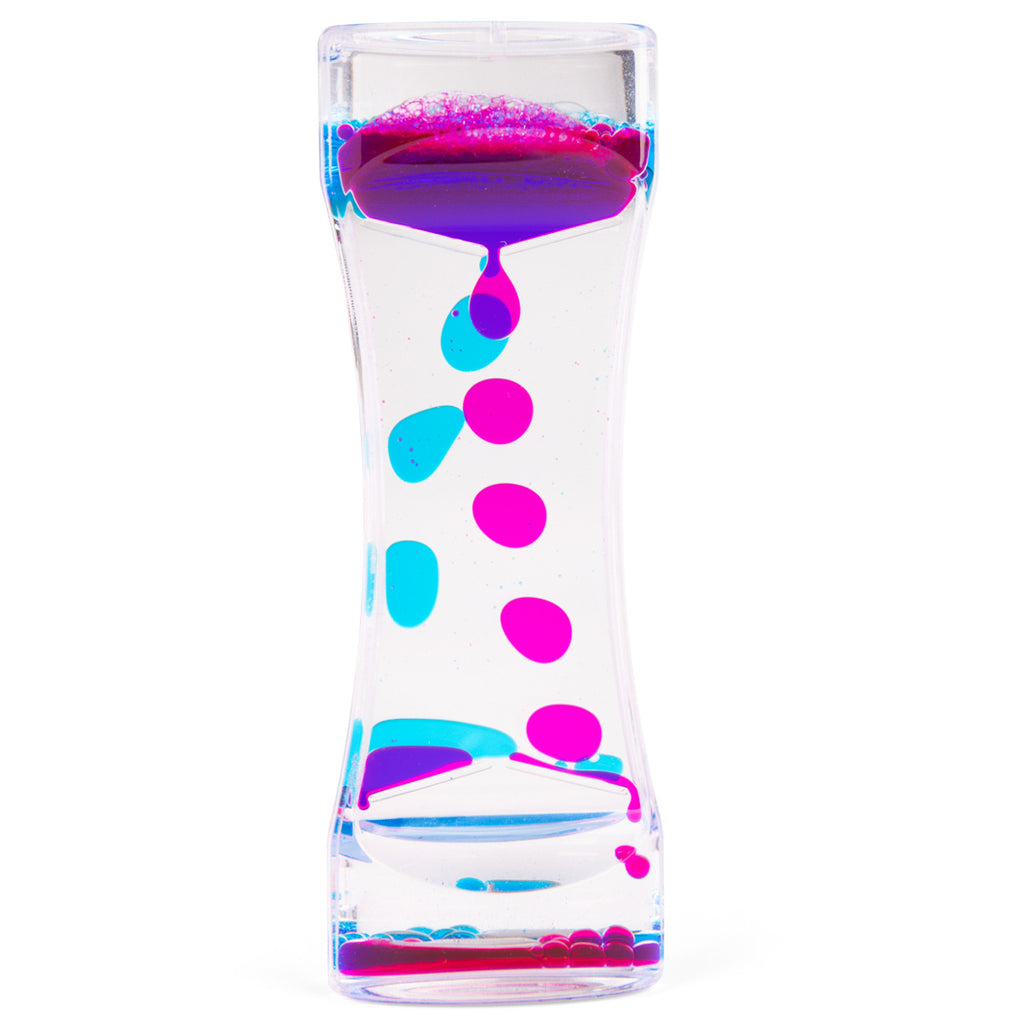 A clear hourglass-shaped liquid timer with vibrant pink and blue droplets cascading down, creating a calming visual effect against a white background.