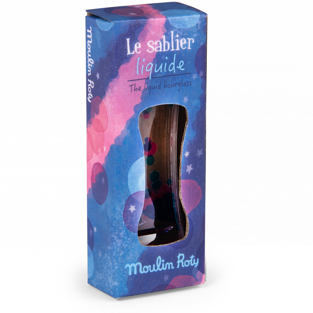 Box packaging for "Le Sablier Liquide," a liquid hourglass by Moulin Roty. The design features a blue and pink cosmic theme with a window showing the item inside.