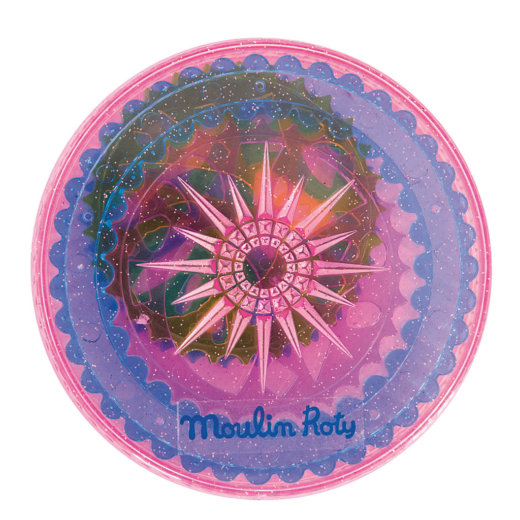 A vibrant circular kaleidoscope with a pink edge, featuring a starburst pattern of spikes and colors. Glittery textures add a playful, magical feel.
