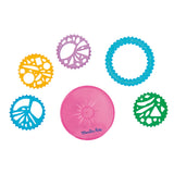 Moulin Roty spirograph drawing toy set with colorful plastic gears and stencils.