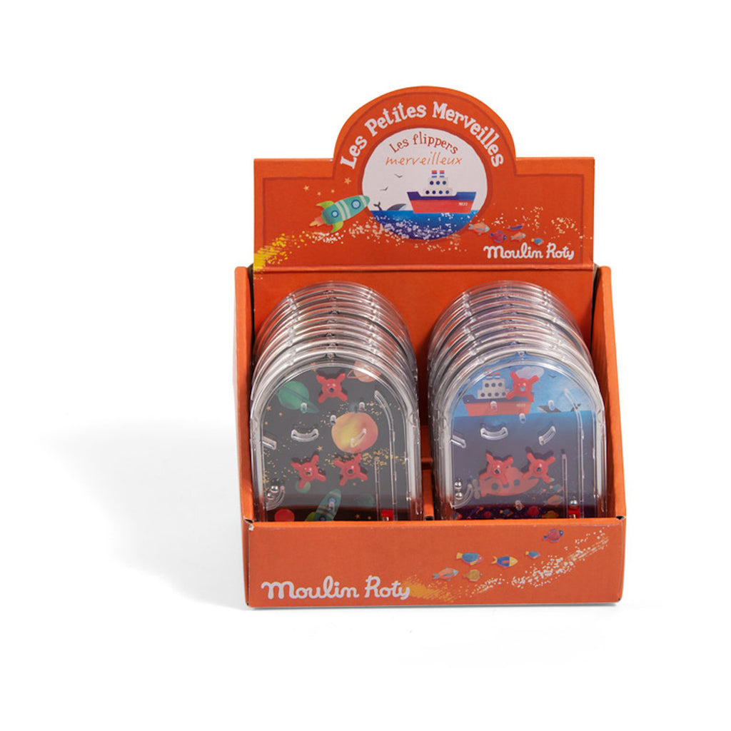 Display box with colorful mini pinball games. The orange box features "Les Petites Merveilles" text. Games have space and ocean themes. Fun and playful.