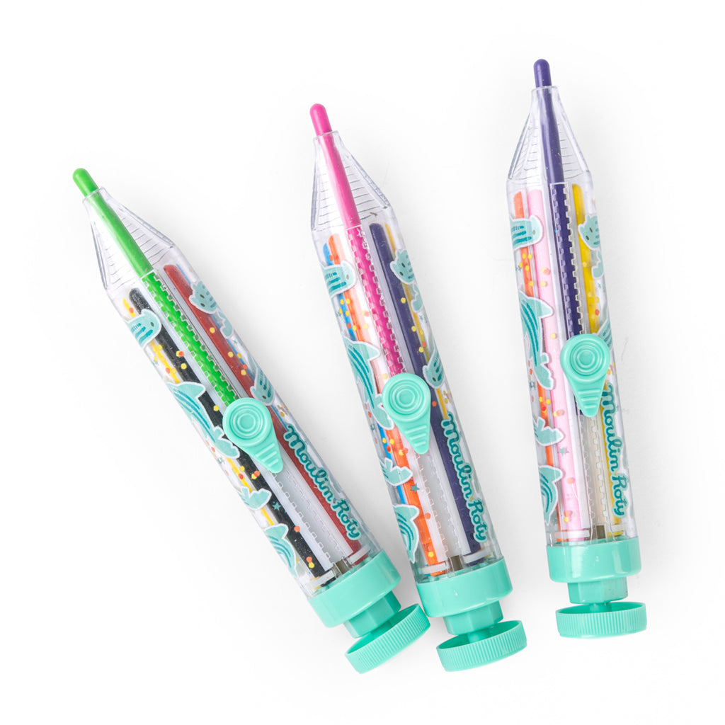 Three colorful multi-tip pens with green, pink, and purple points. Each has a clear barrel, decorative patterns, and pastel turquoise accents. Playful tone.