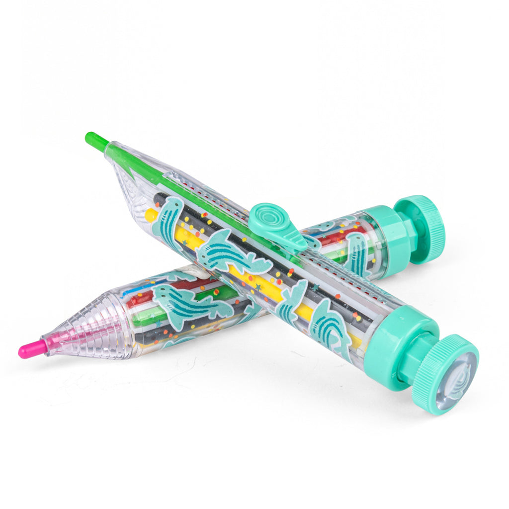 Colorful multi-tip pens with pink and green points. It has a clear barrel, decorative patterns, and pastel turquoise accents. Playful tone.