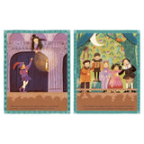 Flat lay view of open paper Little People Big Dreams mini book pages featuring colorful theatrical illustrations.