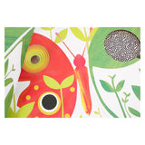 Close-up of a colorful children's book with cut-outs, featuring a vibrant red butterfly and green garden illustrations.