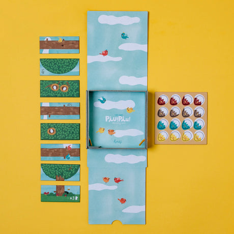 Londji Piu Piu counting board game with illustrated bird tiles, chick tokens, and sky-blue box on a yellow background.