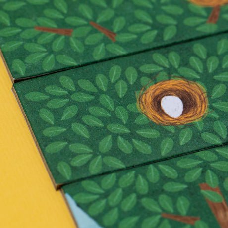 Londji Piu Piu board game tiles featuring an illustrated bird nest with a white egg nestled in green tree leaves.