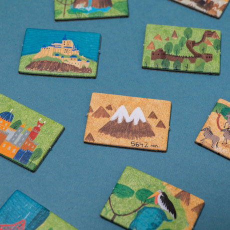 Londji cardboard memory game tiles featuring colorful illustrations of world landmarks like the Great Wall of China.