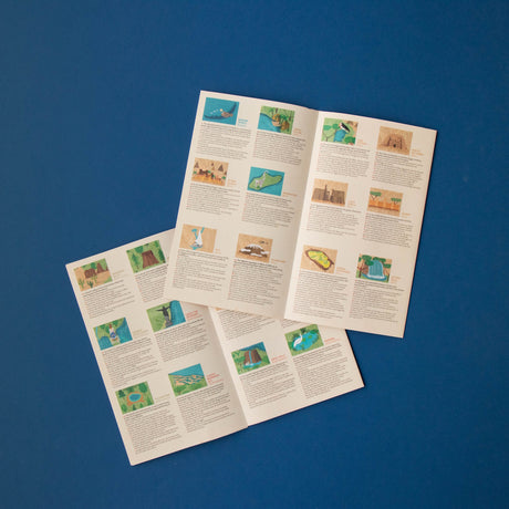 Educational booklet from Londji Wonderful World game featuring colorful maps and facts about world landmarks and nature.