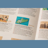 Educational book page for Londji Wonderful World game showing Madagascar with a ring-tailed lemur illustration.