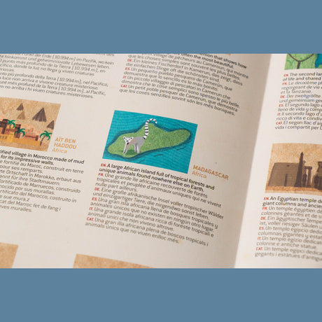 Educational book page for Londji Wonderful World game showing Madagascar with a ring-tailed lemur illustration.