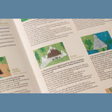 Close-up of a Londji educational booklet featuring Denali, with multilingual descriptions and colorful illustrations.