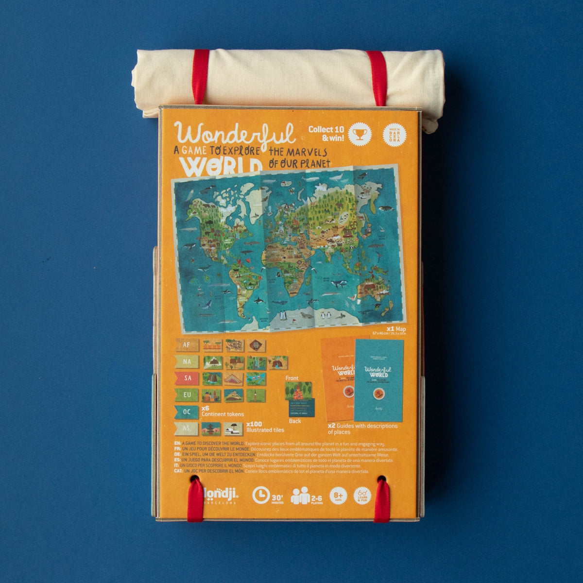 Back of Londji Wonderful World game box showing world map, illustrated tiles, and continent tokens on blue background.